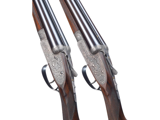 A fine and rare pair of 12-bore single-trigger sidelock ejector guns by John Dickson & Son, no. 6751/2 In their leather case