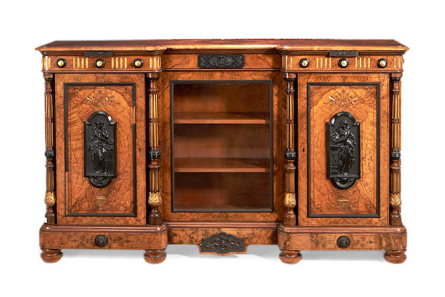 A mid Victorian Gutta-Percha mounted figured walnut and parcel gilt decorated inverted breakfront cabinet