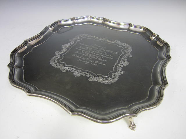 A silver shaped square salver by Barker Brothers Silver Ltd., Birmingham 1948