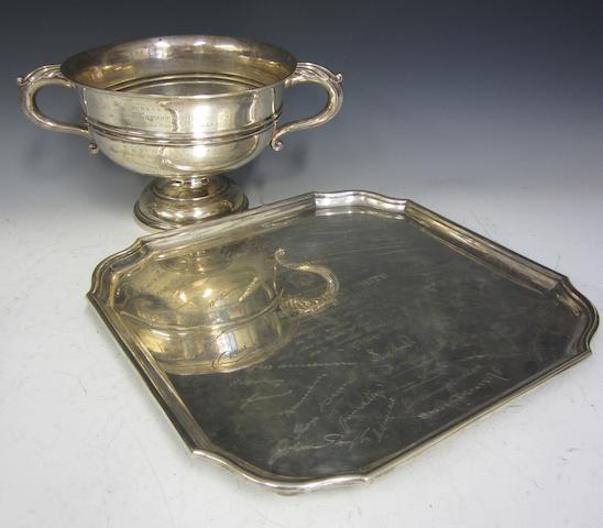 A silver two handled pedestal presentation trophy cup by Walker and Hall, Sheffield 1930  (2)