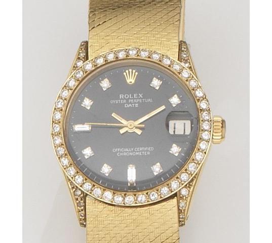 Rolex. An 18ct gold and diamond set automatic calendar bracelet watchDate, Ref:6627, Case No.1560***, Movement No.40***, Circa 1967