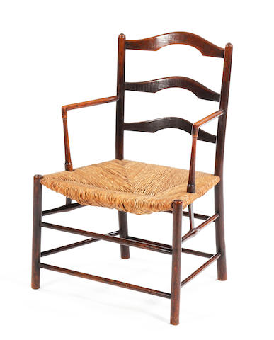 An ash low ladder-back armchair, circa 1840 Attributed to Kerry, Evesham (w.1820-61)