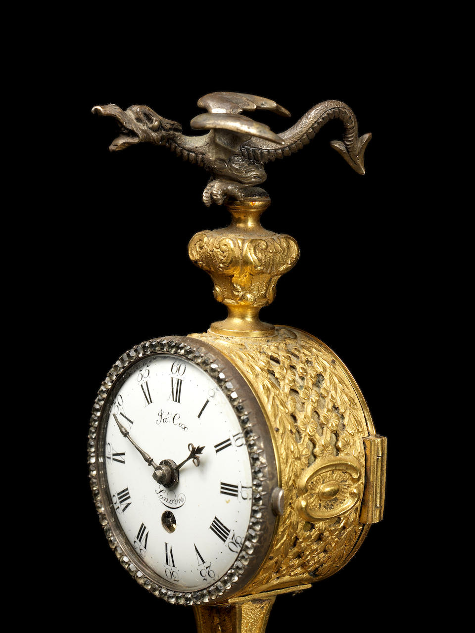 An exceptional mid 18th century agate-panelled and silver-mounted musical ormolu table clock with moonphase indication. Sold with the original key, signed and dated key, James Cox, London, 1766. James Cox, London 2