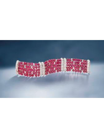 A magnificent ruby and diamond strap bracelet, by Van Cleef & Arpels,