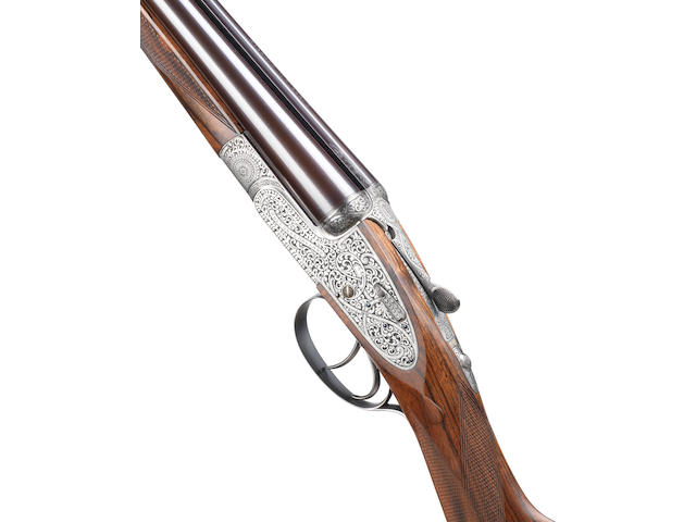 A fine J.G. Salt-engraved 20-bore (2&#190;in) 'The "Royal" Model' self-opening sidelock ejector gun by Holland & Holland, no. 41245 In its brass-mounted oak and leather case with canvas cover