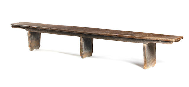 An 18th century elm boarded bench