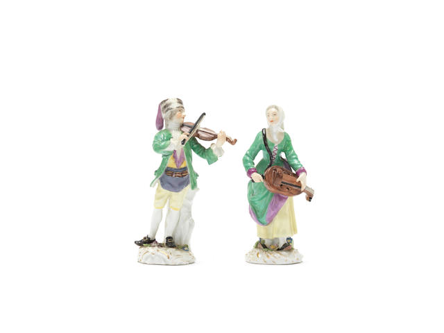 A pair of Meissen 'Cris de Paris' figures of a ballad seller and a female hurdy gurdy player, circa 1753-54
