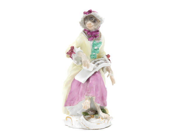 A Meissen monkey band figure of a seated female singer, third quarter 18th century