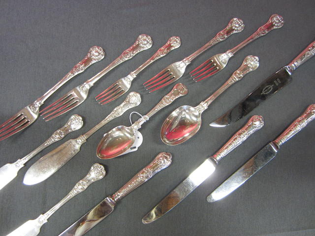 A George IV and later silver composite canteen of Queen's pattern with honey-suckle shell heel for six settings various dates and makers