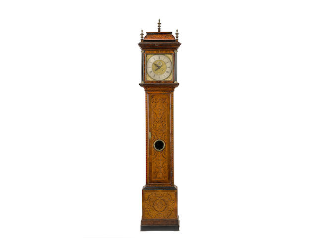 A large first quarter of the 18th century inlaid walnut longcase clock  by Thomas Trout