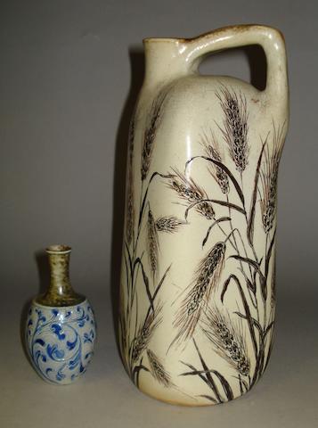 A Martin Brothers jug and a miniature vase