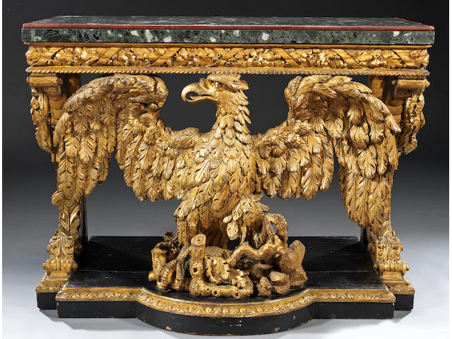 A pair of George II style carved giltwood console tables in the manner of William Kent