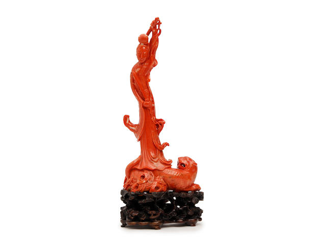 A Chinese carved coral figure of female deity 19th Century