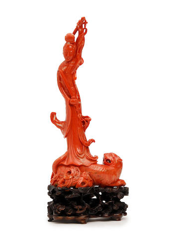 A Chinese carved coral figure of female deity 19th Century