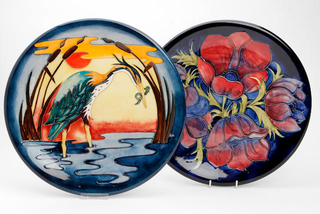 A collection of four Moorcroft chargers