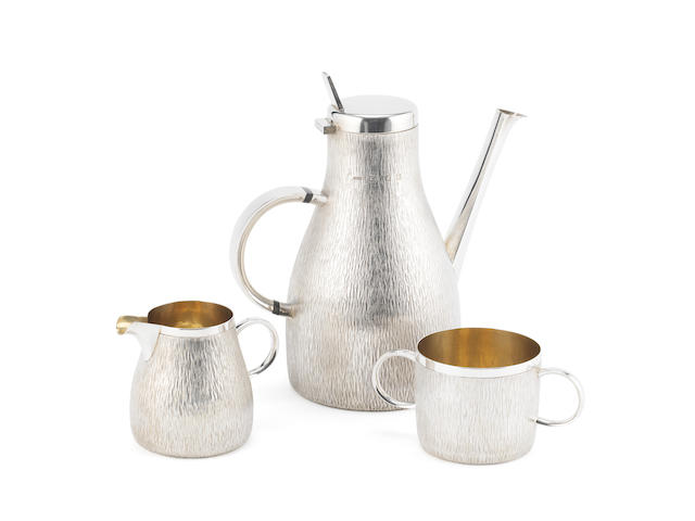 GERALD BENNEY: A  silver three-piece coffee service London 1967, the cream jug 1969, also stamped GERALD BENNEY LONDON, together with a bowl and spoon, by Gerald Benney, London 1967,  (5)