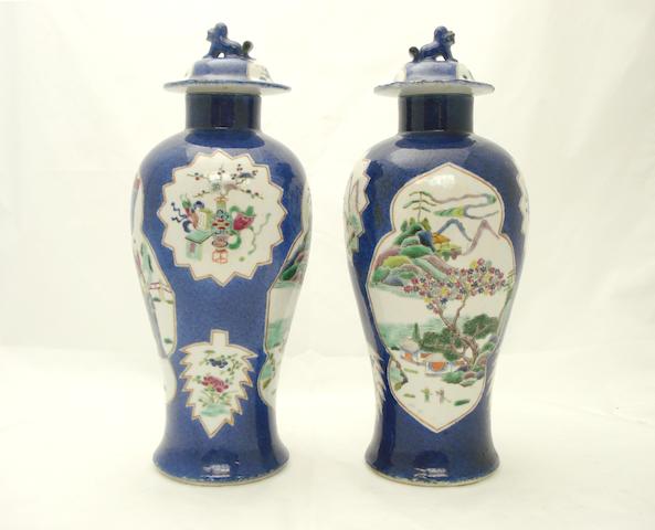A pair of powder blue ground vases with covers Bearing Kangxi marks but late 19th century
