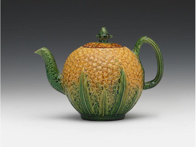 A Staffordshire lead-glazed pineapple teapot and cover, circa 1765