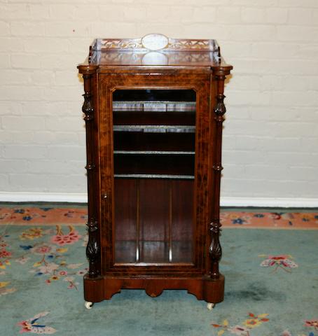 A Victorian burr walnut music cabinet