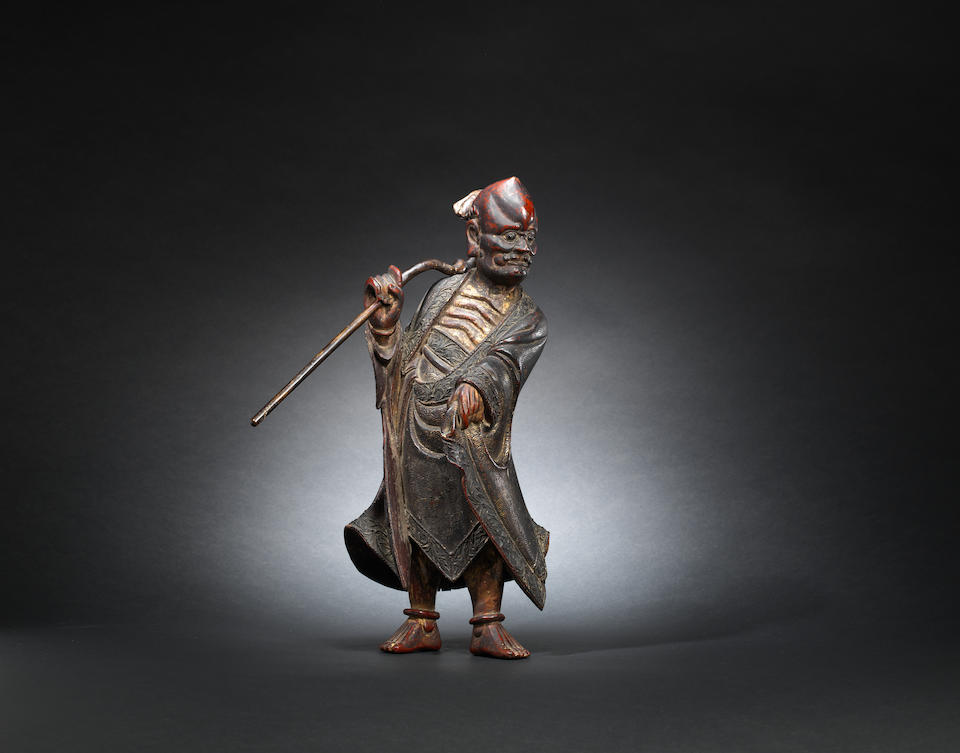 A gilt-lacquer wood figure of a luohan Late Ming dynasty