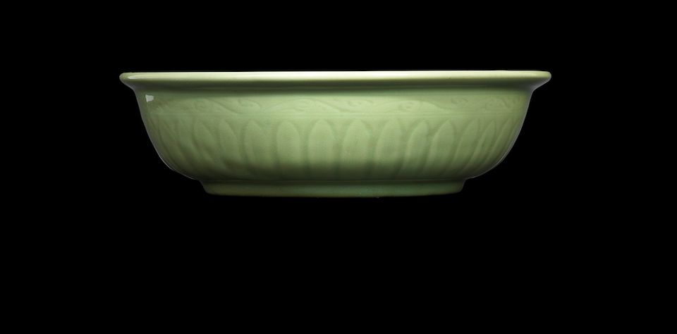 A finely potted celadon 'twin fish' dish Ming dynasty