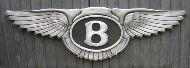 A Bentley 'winged B' garage display emblem,