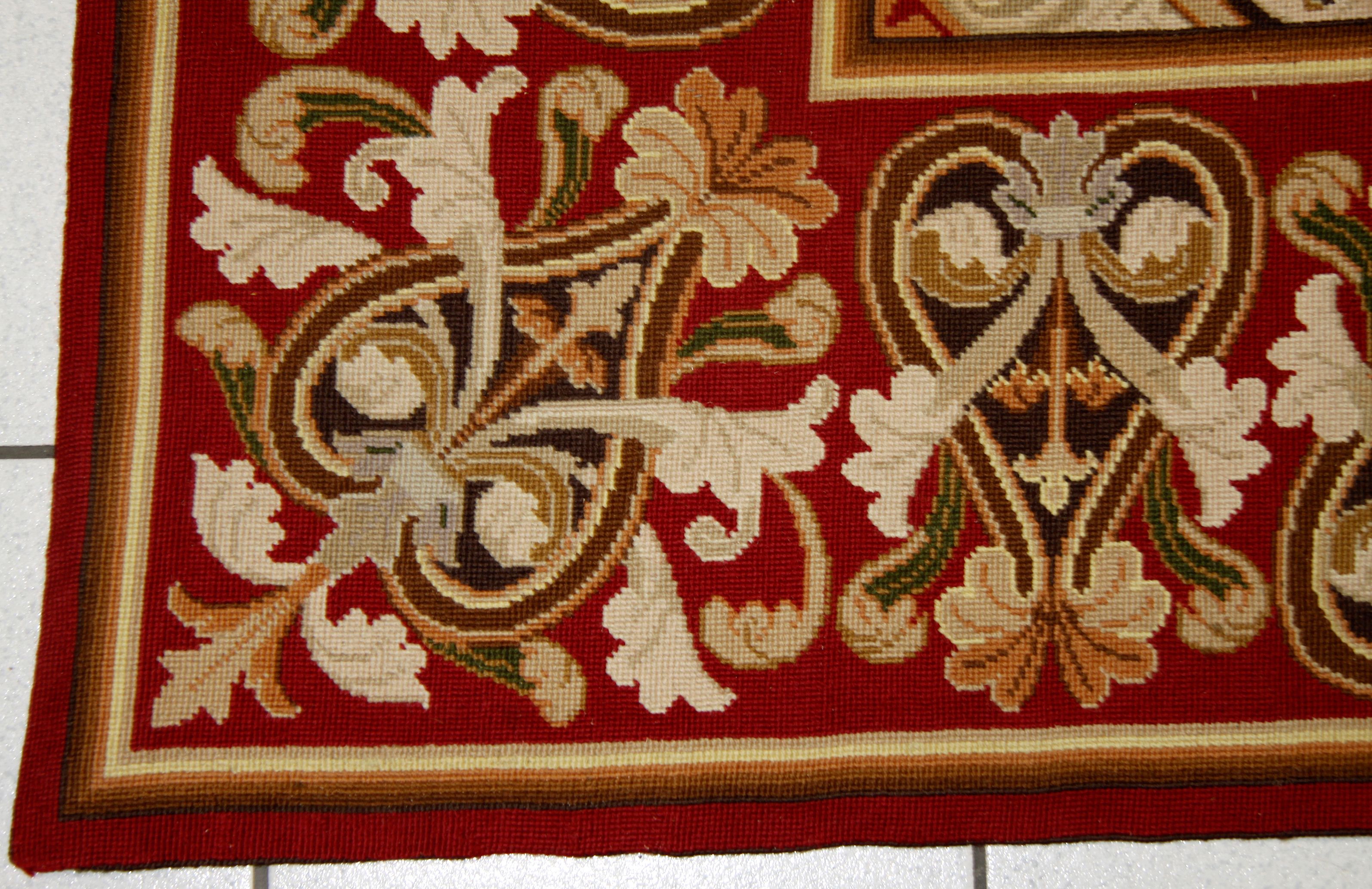 A needlework carpet,