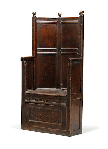 An exceptionally rare mid-16th century oak enclosed box armchair English, circa 1540 - 1560