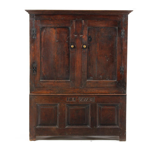 An oak livery cupboard 18th century, with adaptations