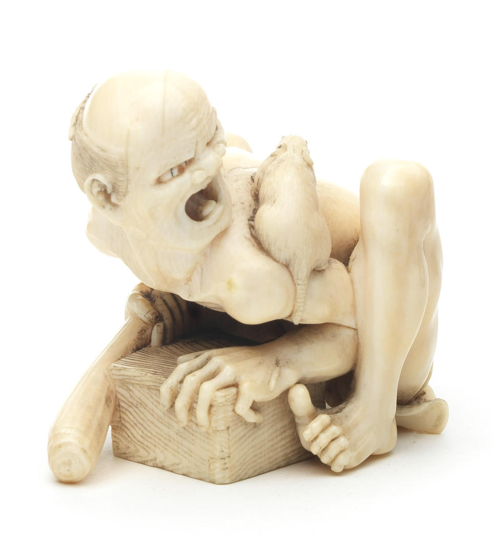 An ivory netsuke okimono of a disappointed ratcatcher Meiji period