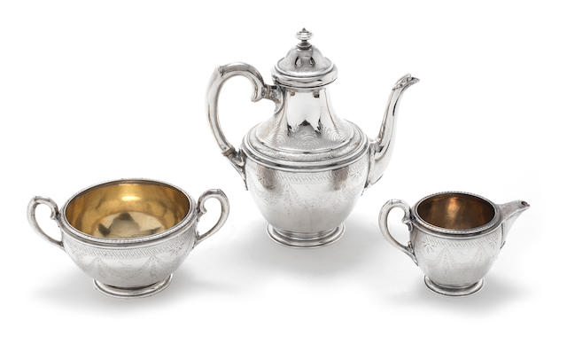 A silver three-piece tea service by Robert Garrard, London 1870  (3)