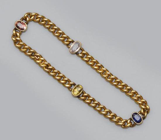 A vari gem-set bracelet and four gem set rings (5)