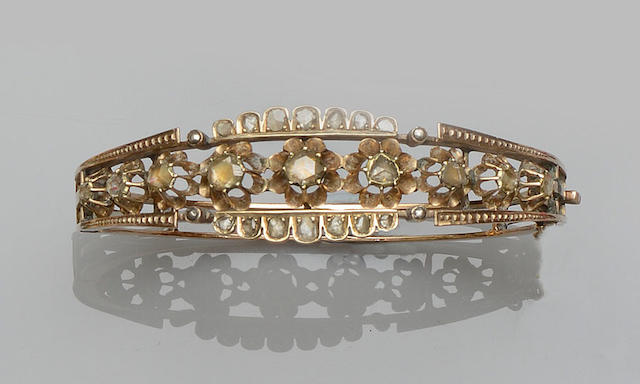A diamond set hinged bangle