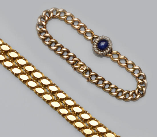 A chain-link necklace and curb-link bracelet (2)
