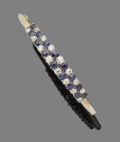 A sapphire and diamond hinged bangle