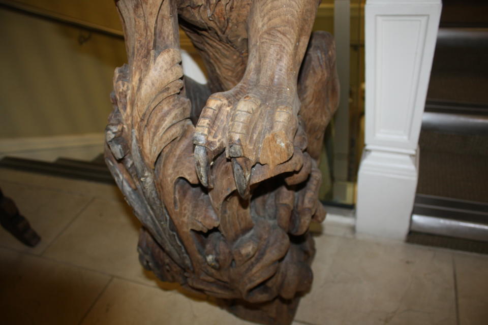 A large and impressive Victorian carved oak dragon newel postfourth quarter 19th century