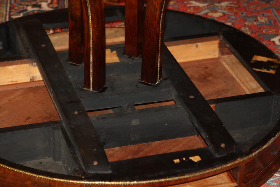 A Regency rosewood and gilt-metal mounted library tableIn the manner of Gillows