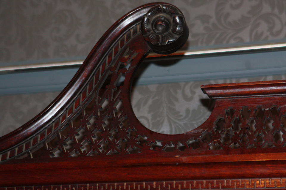 A late 19th century mahogany break-front bookcase Of George III design