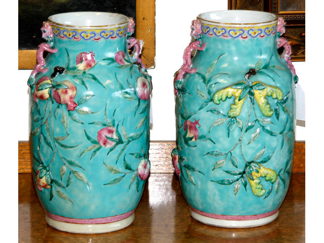 A pair of late 19th Century Chinese famille rose vases,