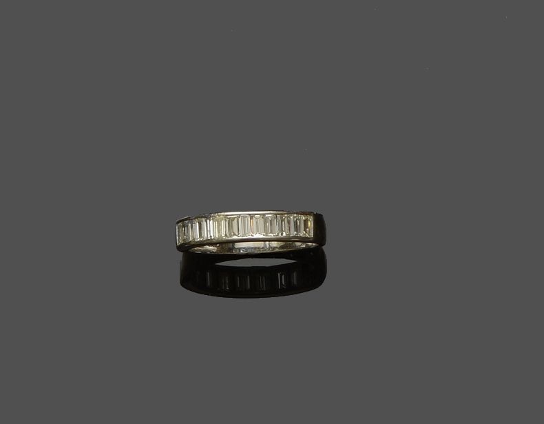 A diamond half hoop ring
