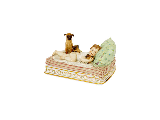 A Meissen figure of a boy and dogs, circa 1860-70