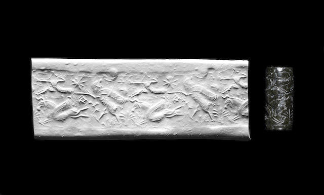 A Neo-Assyrian serpentine cylinder seal