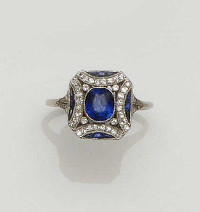 An Art Deco sapphire and diamond panel ring