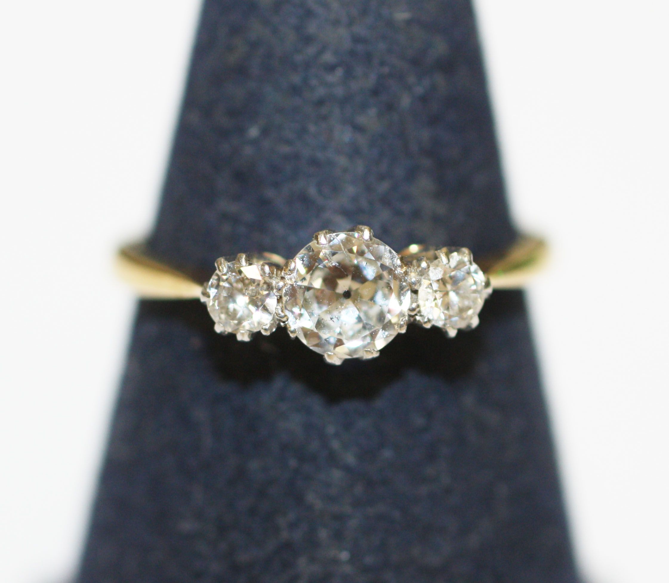 A three stone diamond ring,