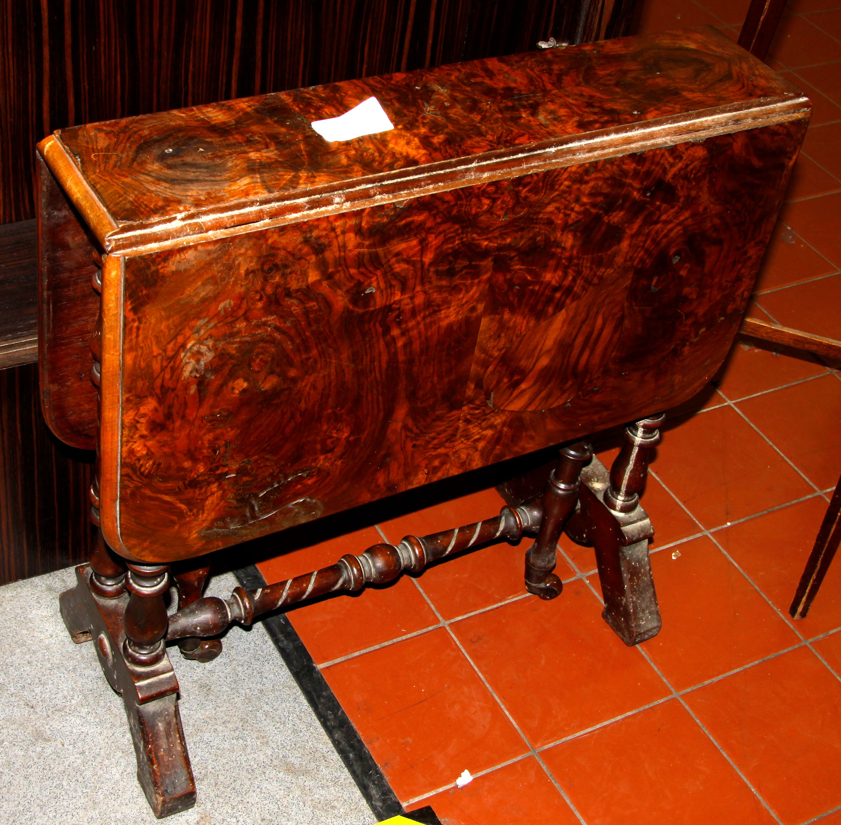 A Victorian walnut Sutherland table