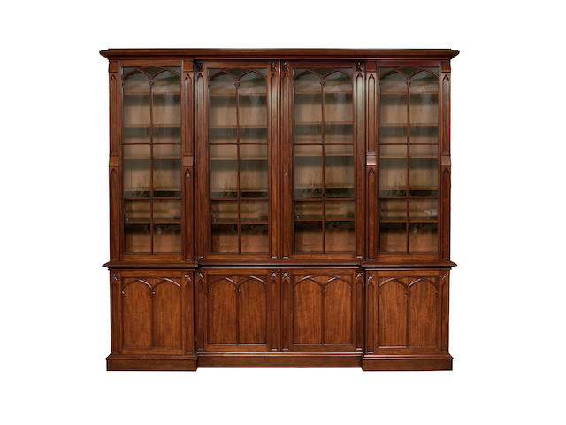 A William IV mahogany inverted break-front library bookcase cabinetIn the Gothic taste, second quarter 19th century