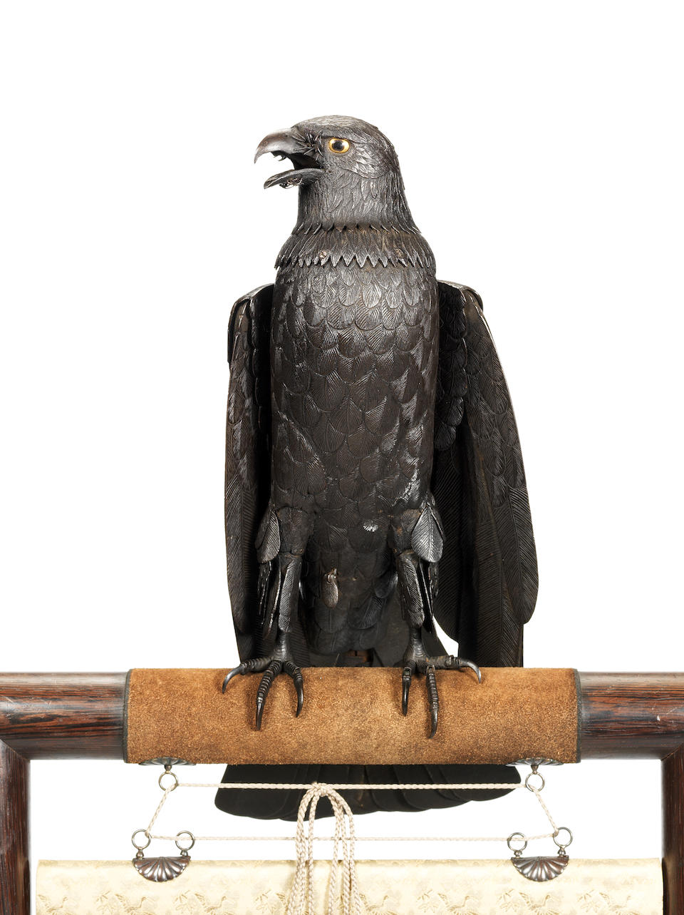 A fine and rare iron kusshin jizai (fully articulated) okimono model of a hawk Attributed to Itao Shinjiro (1842-1911), circa 1894