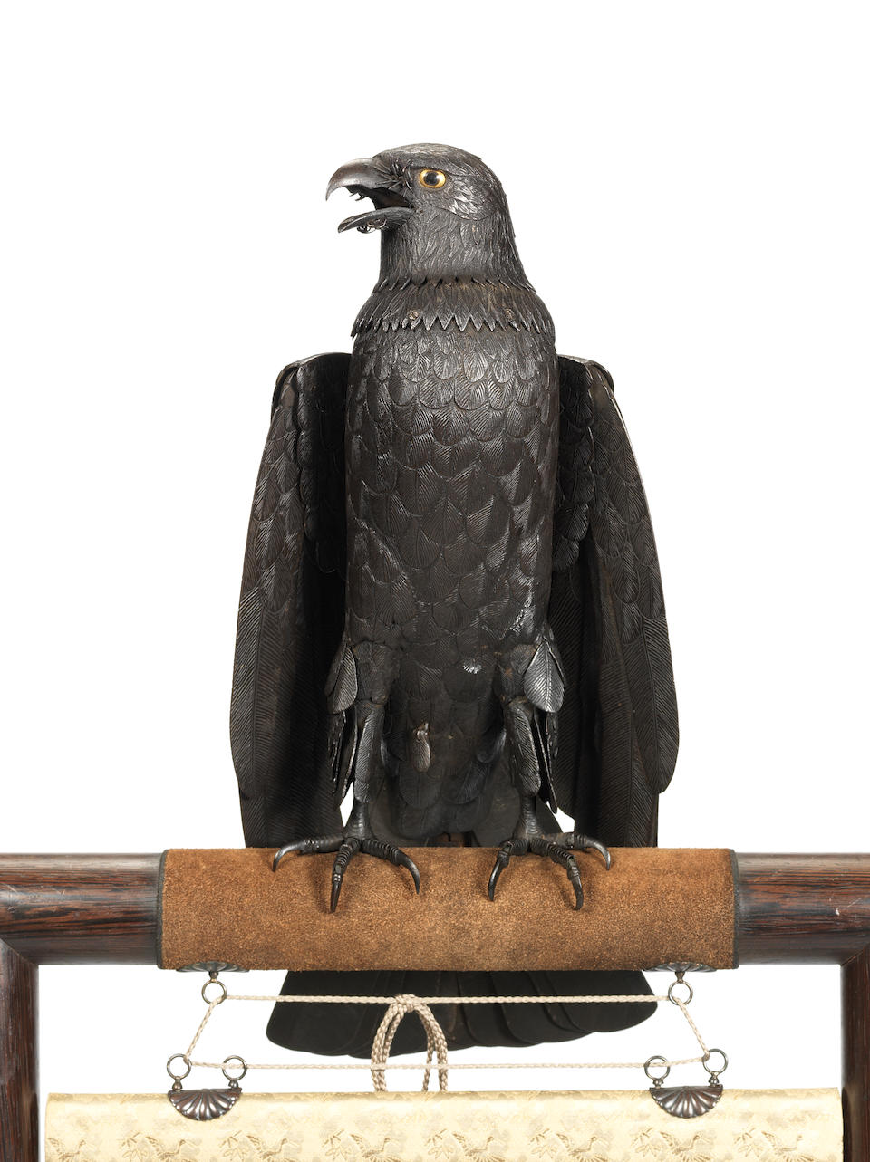 A fine and rare iron kusshin jizai (fully articulated) okimono model of a hawk Attributed to Itao Shinjiro (1842-1911), circa 1894