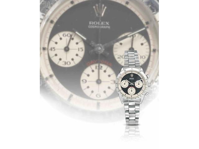 Rolex. A fine and rare stainless steel manual wind chronograph bracelet watch with Rolex Guarantee booklet stamped for the F.I.C West Store, Falkland Islands.Daytona 'Paul Newman', Ref:6239, Serial No.166***, Sold 3rd July 1971