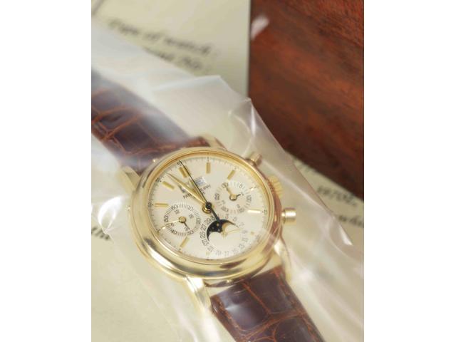 Patek Philippe. A very fine and rare 18ct gold chronograph perpetual calendar manual wind wristwatchRef:3970E, Case No.2873775, Movement No.875923, Made in 1991